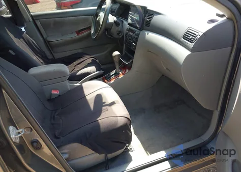 2005 Toyota Corolla Le z USA, uszkodzony, nr VIN 2T1BR32E55C403493